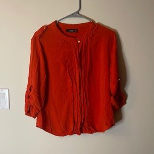 Orange three quarter sleeve shirt